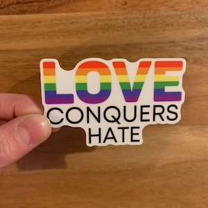 Love Conquers Hate Sticker