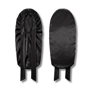 May include: Two black satin bonnets are shown against a white backdrop. One bonnet is displayed from the front, with a gathered crown and long ties. The other bonnet is shown from the back, with a smooth, sleek design and ties.