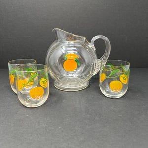 Vintage Hand-Painted Orange Glass Pitcher with Ribbed Handle | MCM Juice or Water Jug | Retro Kitchen Decor.  With 3 hand painted glasses