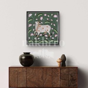 White Cow Pichwai with Pink Lotus – Hand-Painted Kamdhenu on Green – Indian Sacred Wall Art on Cloth (Original)