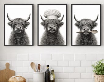 May include: Three framed monochrome prints of Highland cows in a kitchen. One cow holds a whisk, another a chef's hat, and the third a wooden spoon. The artwork provides a playful element to the kitchen's design.