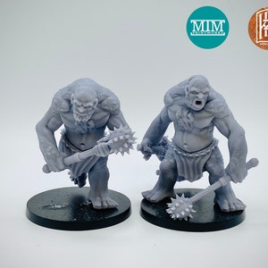 May include: Two grey, 3D printed miniatures of large, muscular humanoids with angry expressions. Each figure is holding a spiked club and standing on a black base. The miniatures are labelled "MIM Printworks" and "HZ Miniatures".