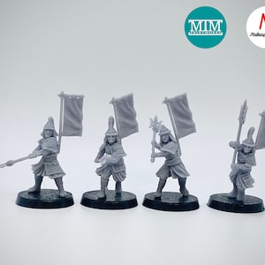 May include: Five gray plastic miniature figures of warriors holding weapons and flags. The figures are standing on black bases. The figures are part of a set of miniatures for tabletop games.