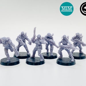 May include: Six grey plastic miniature figures of soldiers, each holding a weapon, standing on black circular bases.