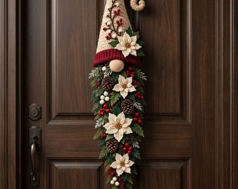 May include: A vertical gnome-shaped wall hanging featuring a beige crocheted hat with a curled tip, a dark red brim, and a round nose. The beard is composed of green pine needles, brown pinecones, white berries, red berries, and cream flowers.