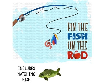 May include: A blue and white game board with a fishing rod and a red bobber. The text "Pin the Fish on the Rod" is written in brown letters. The game includes matching fish.
