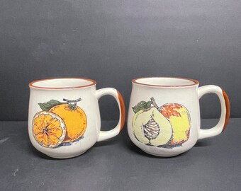 Vintage pair of Korean fruit coffee mugs beige with orange and peach tea cups brown rim and handle made in Korea mcm stoneware