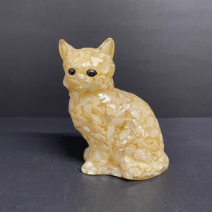 1950年代にテネシー シェル カンパニーによって手作りされたヴィンテージの本物の真珠貝の猫の置物。黒色の猫型の像。米国製。