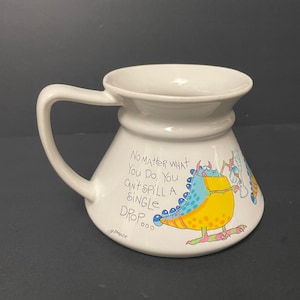Vintage no spill mug Moouz Gilmore with blue and yellow cartoon monster dinosaurs Character Coffee Tea Mug Cup