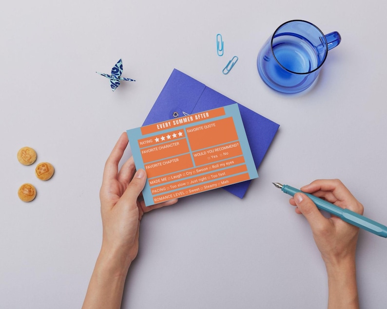 May include: A light blue and orange card with the text "Every Summer After" and a rating system. The card has sections for "Rating", "Favorite Character", "Favorite Chapter", "Made Me", "Romance Level", and "Would You Recommend".