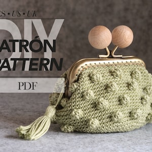 May include: A green crocheted coin purse with a brass frame and wooden toggles. The purse has a tassel and the text "DIY PATRÓN PATTERN PDF" is visible in the background.