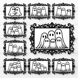 May include: A collection of black framed wall art featuring white ghost designs. The designs include ghosts embracing, family groups, and ghosts with pets. The frames have ornate, decorative edges, perfect for Halloween or spooky decor.