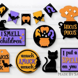 Puede incluir: Un conjunto de 10 recortes de madera con tem&aacute;tica de Halloween. Los recortes presentan varios dise&ntilde;os espeluznantes, que incluyen un sombrero de bruja, un caldero, un gato, un murci&eacute;lago y una escoba. Los recortes est&aacute;n pintados en negro, naranja, morado y amarillo.