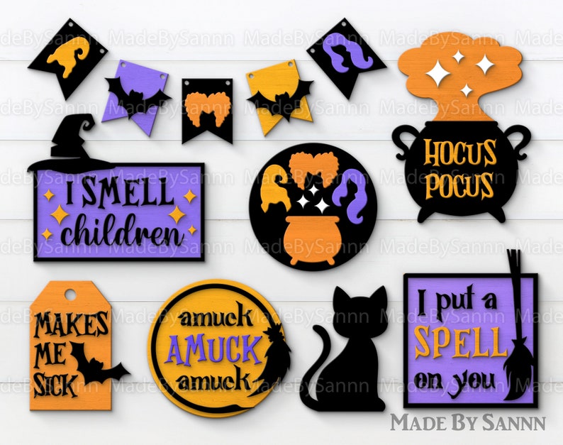Puede incluir: Un conjunto de 10 recortes de madera con tem&aacute;tica de Halloween. Los recortes presentan varios dise&ntilde;os espeluznantes, que incluyen un sombrero de bruja, un caldero, un gato, un murci&eacute;lago y una escoba. Los recortes est&aacute;n pintados en negro, naranja, morado y amarillo.