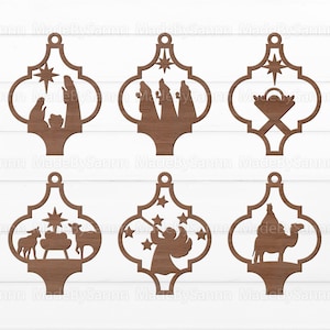 May include: Six wooden Christmas ornaments with a Moroccan-style design. Each ornament features a different scene from the Nativity story, including the three wise men, the manger, the star of Bethlehem, the angel Gabriel, and the shepherds.
