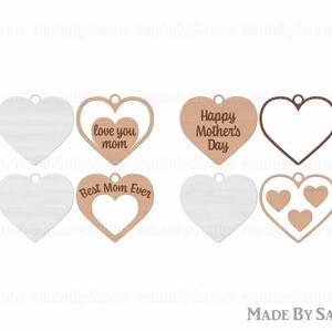Puede incluir: Seis adornos de madera en forma de coraz&oacute;n con diferentes dise&ntilde;os. Uno tiene el texto "Love you mom", otro dice "Happy Mother's Day" y otro dice "Best Mom Ever". Dos est&aacute;n en blanco y uno tiene tres corazones m&aacute;s peque&ntilde;os dentro.