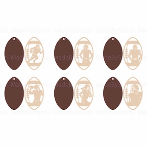 May include: A collection of six football-themed earrings. Each earring features a brown oval shape paired with a football-shaped cutout. The cutouts depict football players in action. The earrings are designed with a small hole at the top for hanging.