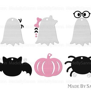 May include: Set of six Halloween-themed printable tags featuring a ghost, bat, pumpkin, spider, and two ghosts with different accessories. The tags are black, white, and pink.