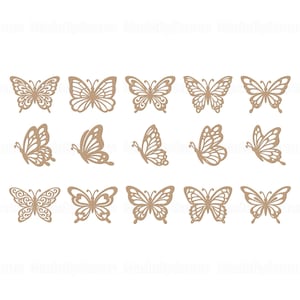 May include: A collection of fifteen intricately cut-out butterflies in various designs. The butterflies are a light brown color and are arranged in three rows of five on a white background. The wings have detailed patterns.