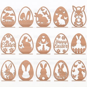 Könnte beinhalten: Set aus 12 lasergeschnittenen Holz-Ostereiershablonen mit Hasen, Schmetterlingen, Blumen und den Worten "Frohe Ostern" und "Ostern".