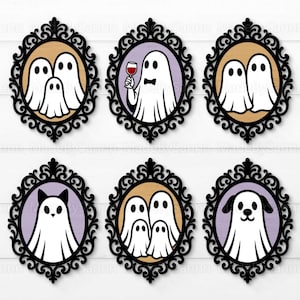 May include: A collection of six framed Halloween-themed art pieces. Each frame is black with an ornate design, surrounding a circular image. The images feature white ghost figures with different expressions and accessories, set against various colored backgrounds.