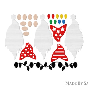 May include: Wooden gnome craft kit with various components. Includes white gnome bodies, wooden oval faces, red hats with white polka dots and stripes, and a black vine with leaves. Also includes a hat with stars and stripes.