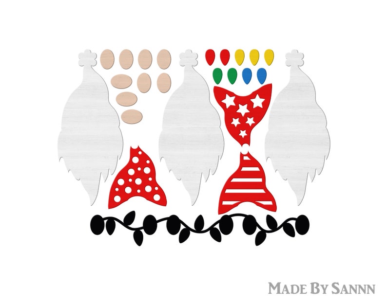May include: Wooden gnome craft kit with various components. Includes white gnome bodies, wooden oval faces, red hats with white polka dots and stripes, and a black vine with leaves. Also includes a hat with stars and stripes.