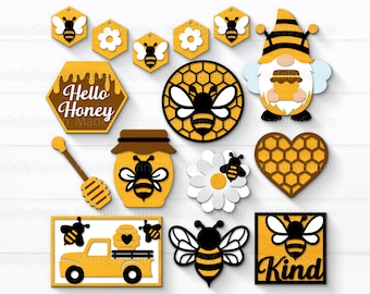 May include: A set of 11 laser cut wooden honeybee themed decorations. The decorations include a beehive, a bee, a honey pot, a truck, a gnome, a heart, a daisy, a sign that says "Hello Honey", and a sign that says "Kind".