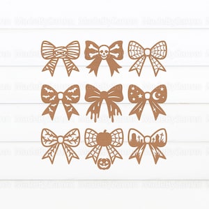 Pode incluir: Nove la&ccedil;os decorativos castanhos com designs tem&aacute;ticos de Halloween. Os la&ccedil;os apresentam v&aacute;rios padr&otilde;es recortados, incluindo uma m&uacute;mia, caveira, teia de aranha, morcegos, efeito de gotejamento, estrelas e lua, folhas, ab&oacute;bora e um cemit&eacute;rio.