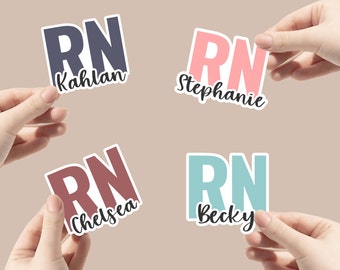 May include: Four stickers with the letters "RN" in different colors and fonts. Each sticker has a name below the letters: "Kahlan", "Stephanie", "Chelsea", and "Becky".