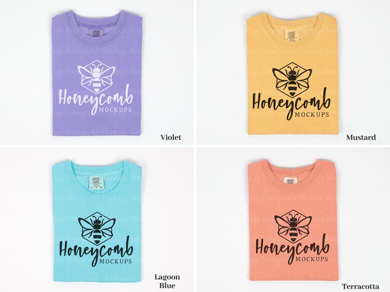 May include: Four different colored t-shirts with a bee graphic and the text "Honeycomb Mockups" printed on the front. The colors are violet, mustard, lagoon blue, and terracotta.