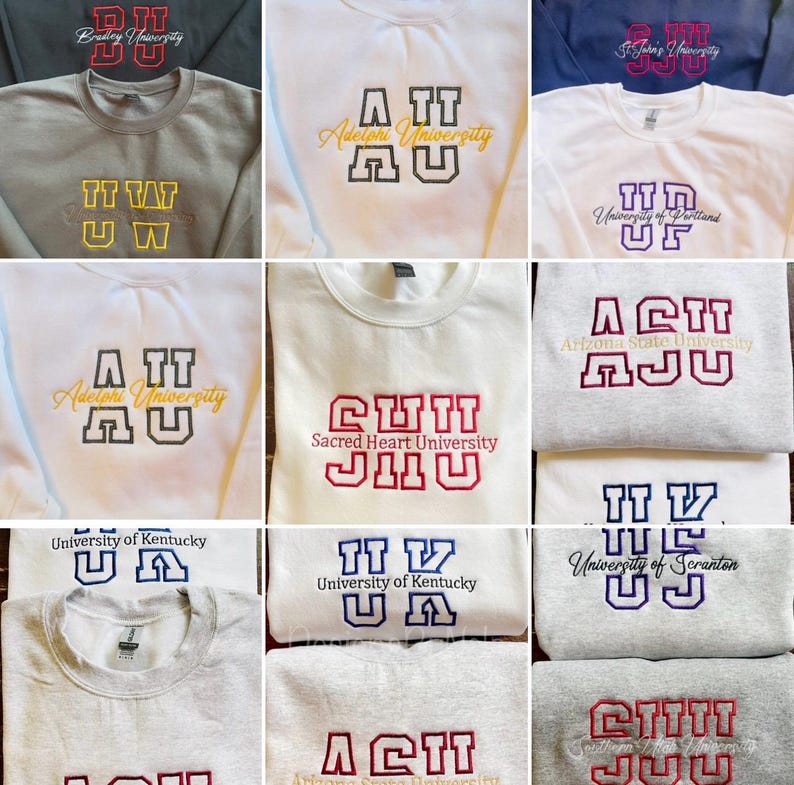 May include: A collection of crewneck sweatshirts featuring embroidered university names and logos. The sweatshirts are in various colors, including gray, white, and navy blue. The embroidered text includes the names of different universities.