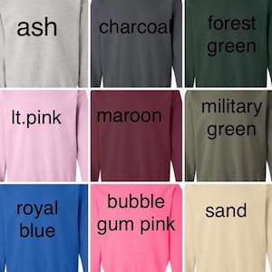 May include: A collection of crewneck sweatshirts in various colors, including ash, charcoal, forest green, and heather gray. Additional colors are lt. blue, lt. pink, maroon, military green, navy, red, royal blue, bubble gum pink, sand, and sport gray.