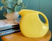 FIESTA disc pitcher vintage made in USA yellow