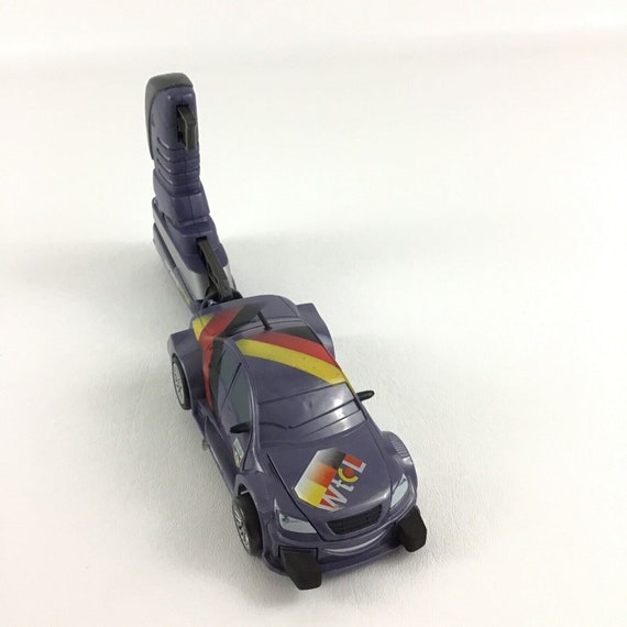 Disney Pixar Cars World Grand Prix Racers Max Schnell Launcher Pop