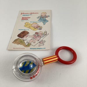 Johnson & Johnson Spinner Rattle Child Development Toy Guide Book Vintage 1980
