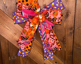 Whimsical Halloween Bow: Pink, Purple & Orange Candy Corn Decor
