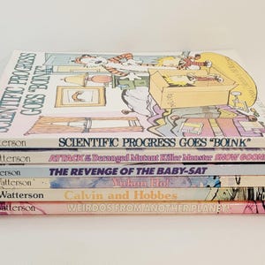 May include: A stack of six Calvin and Hobbes books. The top book is titled "Scientific Progress Goes 'Boink'" with a colorful cartoon illustration. Other titles include "Attack & Deranged Mutant Killer Monster Snow Goons."