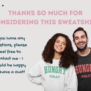 May include: Two people wearing sweatshirts with the text "HUNGRY PIGLET" in green and red lettering. The text is in a collegiate font style. The person on the left is wearing a white sweatshirt with green lettering. The person on the right is wearing a black sweatshirt with red lettering.