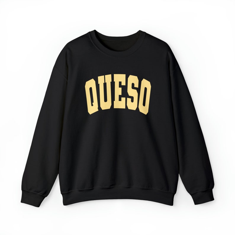 May include: Black sweatshirt with a gold "QUESO" graphic printed on the front.