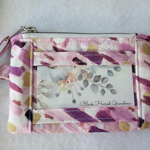 Mini llavero con cordón para la muñeca y bolsillo de vinilo transparente con ventana