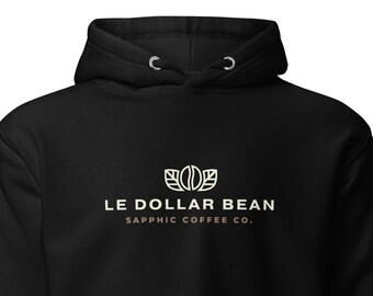 Sudadera con capucha acogedora de Le Dollar Bean Sapphic: apoya a la comunidad LGBTQ+ con una taza de café.
