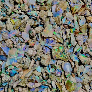 May include: A set of three ceramic mugs with a speckled, matte finish. The mugs are in shades of cream, light gray, and dark gray. Each mug has a simple, minimalist design, perfect for coffee or tea.