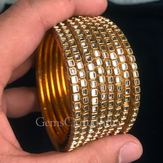 Gold chur bangles discount
