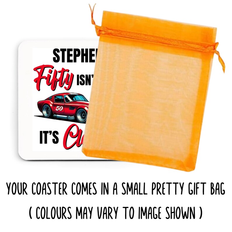 以下が含まれることがあります： 「Stephen Fifty Isn't It's Cool」の文字と赤いスポーツカーのグラフィックが描かれた白いコースター。コースターはオレンジ色のギフトバッグに入っています。