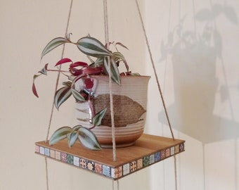 Hanging flower shelf. Wild oak, solid wood, naturally oiled or light with beeswax glaze. 2-piece set. Choice of solid wood or Marrakech multicolored/blue.