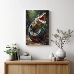 May include: A rectangular wall art print featuring a detailed painting of a snake with its mouth open, displaying sharp teeth. The snake has iridescent scales in shades of blue, green, orange, and brown, set against a dark, forest-like background.