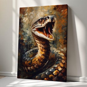 May include: A rectangular canvas wall art piece featuring an oil painting of a snake with its mouth open, displaying sharp fangs. The artwork uses a palette of deep browns, oranges, and golden yellows with visible, thick brushstroke textures.