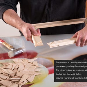 May include: A wooden canvas stretcher bar frame being assembled, accompanied by a rubber mallet and a pile of small wooden corner wedges. A black text box is present with the following text: Every canvas is carefully handmade from start to finish, guaranteeing a strong frame and great quality. The vibrant colours are produced with high quality, lightfast inks that resist fading, ensuring your artwork maintains its brilliance over time.