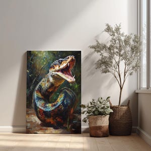 May include: A rectangular wall art print featuring an oil painting of a coiled snake with its mouth open, displaying sharp fangs. The snake has a textured, multi-coloured scale pattern in shades of orange, blue, yellow, and dark brown.